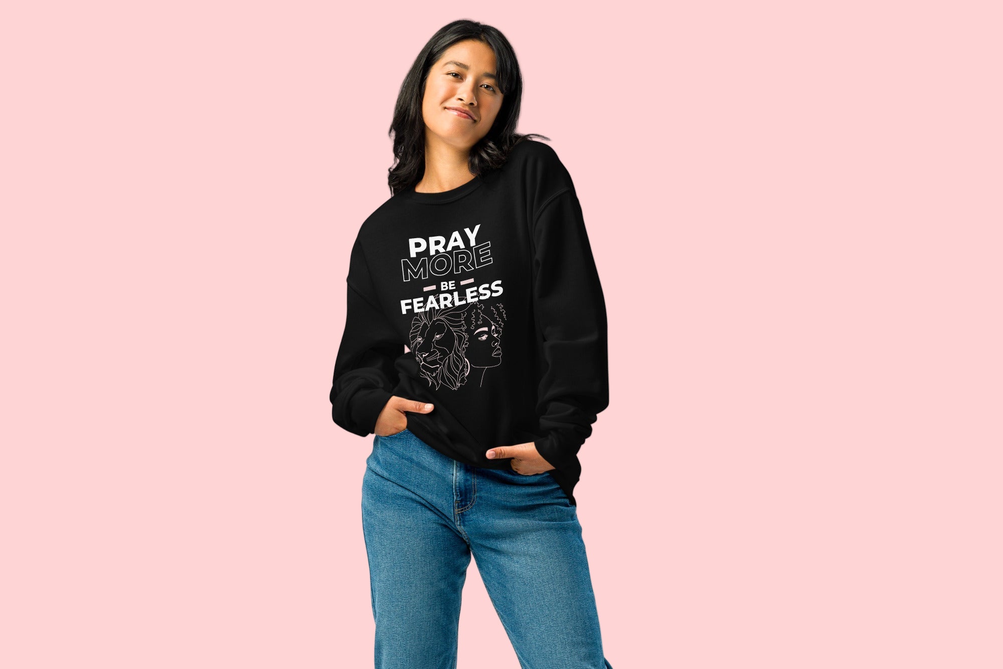 Woman wearing a black sweatshirt with text and graphics on a white background
